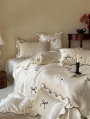 Ivory Vintage Bowknot Embroidered Ruffled Comforter Set